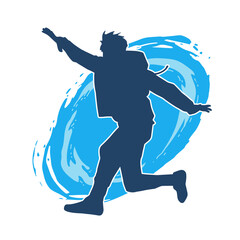 Silhouette of a female dancer in action pose. Silhouette of a slim woman in dancing pose.