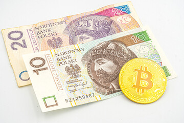 Bitcoin Cryptocurrency virtual money and Poland Zloty Currency. Cryptocurrency Bitcoin coins on Polish Zloty money. Poland PLN Bitcoin Zloty Money Cryptocurrency Blockchain BTC Mieszko I Prince