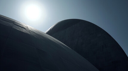 The curved shape of a dome is silhouetted against the sky creating a sense of grandeur.
