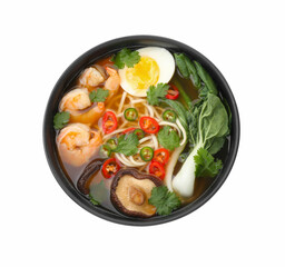 Delicious ramen with shrimps and egg in bowl isolated on white, top view. Noodle soup