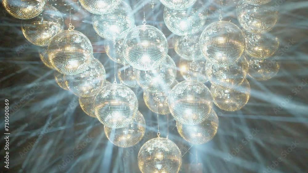 Poster dynamic laser light show by projecting lights onto hazy mirror balls