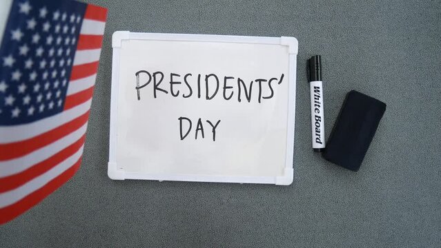 Happy president's day written on a white board. Background Video. Greeting 4K video.