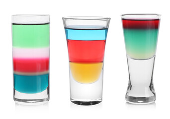 Different shooters in shot glasses isolated on white, set