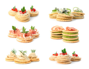 Delicious crackers with different toppings isolated on white, set