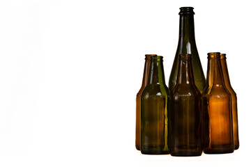 some bottles ready to be recycled on white background with copy space