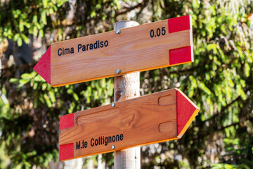 Sign post showing direction to famous Cima Paradiso on beautiful autumn day, Italy