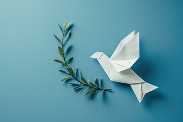 Blue background with paper origami dove olive branch World Peace Day idea