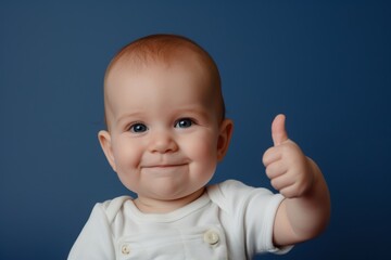Baby with thumbs up