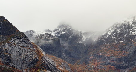 Veiled Titans: Misty Mountain Faces of Lofoten, Norway
