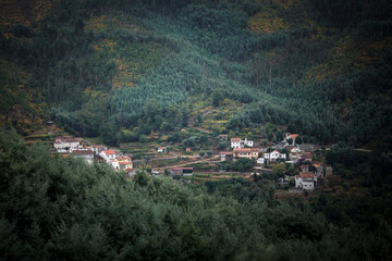 Fototapeta na wymiar A village on a foggy morning in the Serra da Estrela mountains in Portugal.