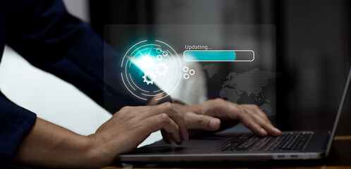 Business person using laptop computer connecting internet online loading file from virtual digital data server. Technology and innovation concept.