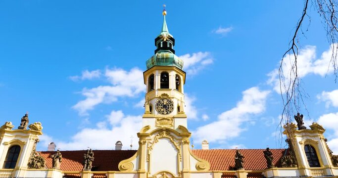 Beautiful Clock and Bell Tower of Loreta Monastery in Prague, Czech Republic
