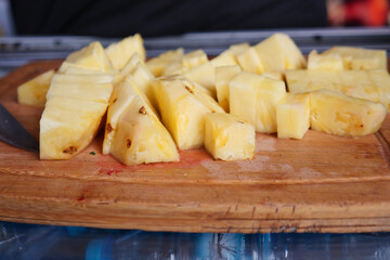 slice of pineapple on a chopping board 
