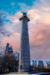 New York City Skyline and Dramatic Cloudscape at Fort Greene Park in Brooklyn, with the view of...