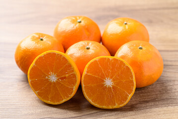 Mandarin orange fruit on wooden background, Tropical fruit