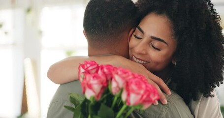 Couple, hug and flowers or smile for valentines day with love or surprise bouquet for relationship, anniversary or date. Man, woman and embrace in home with roses for marriage, celebration or present