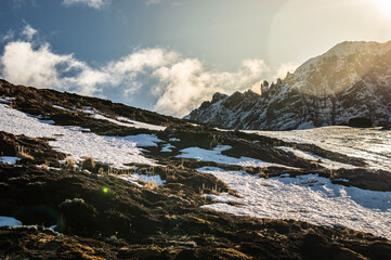 Sun setting behind the mountain of the Andes mountain range. Ushuaia