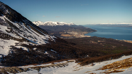 View of Ushuaia from the heights of a snowy hill