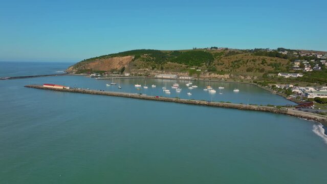 Aerial: Ocean and pier in Oamaru, Otago, New Zealand.