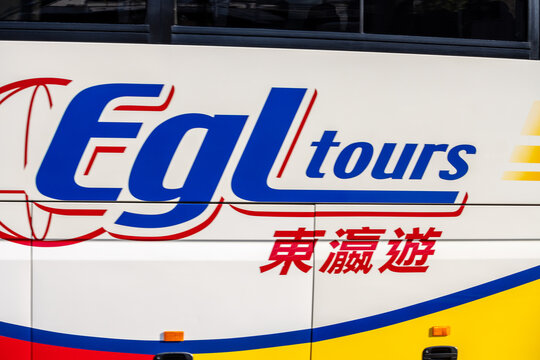 Tokyo, Japan, 2 November 2023: EGL Tours Bus Side View in Urban Setting.