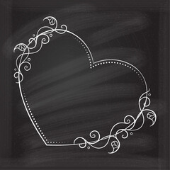 Floral decorative heart shape frame with ivy leaves decoration on a chalkboard background. Monogram, wedding invitation or greeting card template.
