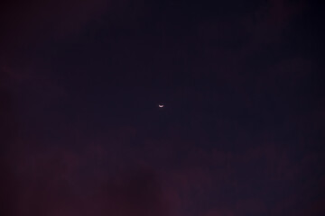 Dark blue sky after sunset and moon