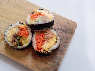 kimbap close-up. Korean style nori roll with yakiniku inside.