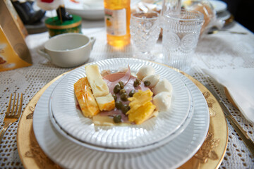 Mouthwatering charcuterie platter featuring gourmet salami, cheese, mortadella, and ham—a...