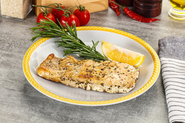 Baked salmon fish served rosemary