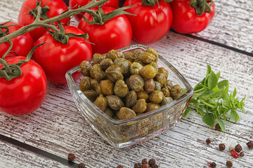 Marinated green capers in the bowl