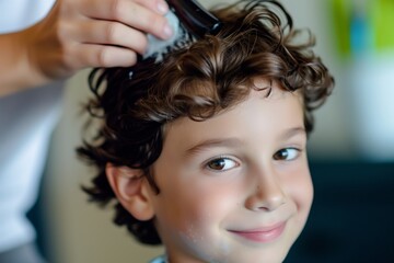 Fototapeta premium young boy getting his hair styled with gel