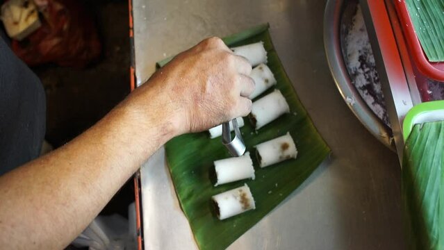 Medan bamboo putu cake covered in banana leaves (Kue Putu)