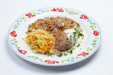 buckwheat with cutlet and sauce