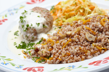buckwheat with cutlet and sauce