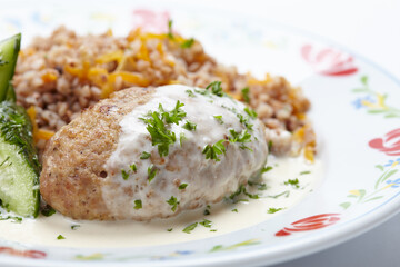 buckwheat with cutlet and sauce