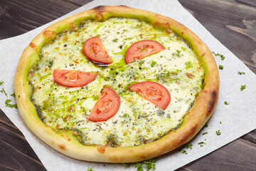 tasty pizza on the wooden background