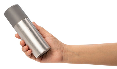 Female hand holding a spray can on white background, Silver perfume spray can or deodorizing spray...