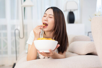 Young Asian girl at home