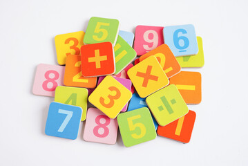 Number wood block cubes for learning Mathematic, education math concept.