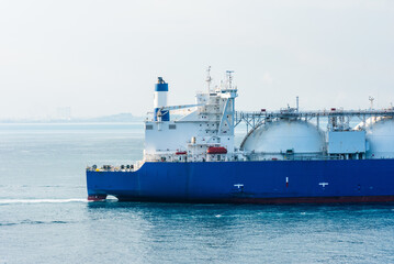 Gas tanker ship sailing through Great Bitter Lake during her Suez Canal transit.