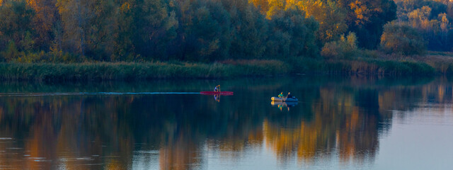 glare and reflections on the water. the sky is reflected in the water. Background of waves,...