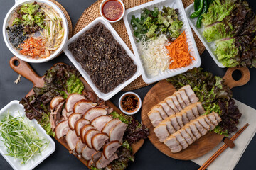Jokbal, bossam, Korean food, braised pork, makguksu, hwangtae, slush, muksabal, side dishes, salted shrimp, lettuce,