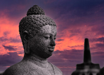 Sunset at Borobudur Temple Yogyakarta Java Indonesia in the eighties. Budha statue.