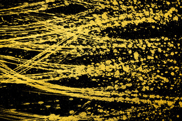 Abstract Gold Paint On Black Paper