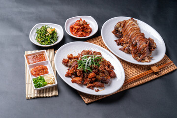 Jokbal, Korean food, steamed pork, tray, buckwheat noodles, side dishes, salted shrimp, lettuce, spicy, oriental medicine, flying fish roe, rice balls,