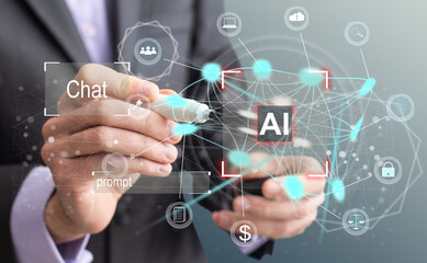 Artificial intelligence concept businessman holding ai on computer screen to using for in document management system and data analysis works