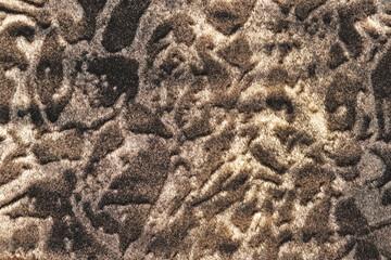 Brown fur fabric background close up