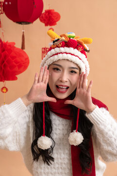 New Year's greetings to a happy Asian young woman