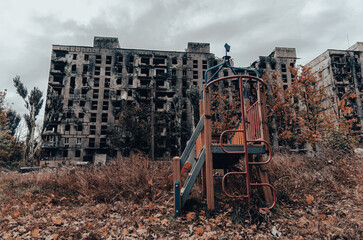destroyed and burned houses in the city during the war in Ukraine