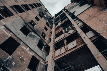 destroyed and burned houses in the city during the war in Ukraine